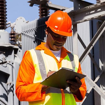 hard hat worker with clip board