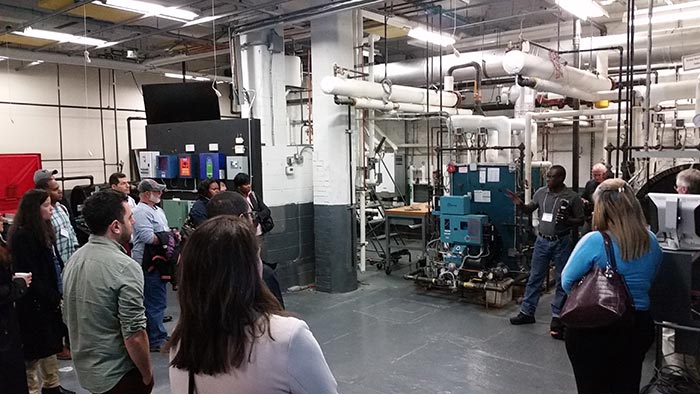 Students observing AEA’s heating and cooling lab.